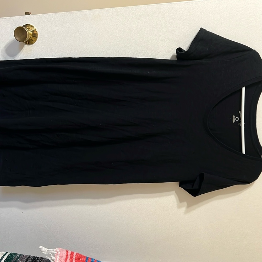 Like new black T-shirt dress from target size small. Knee length